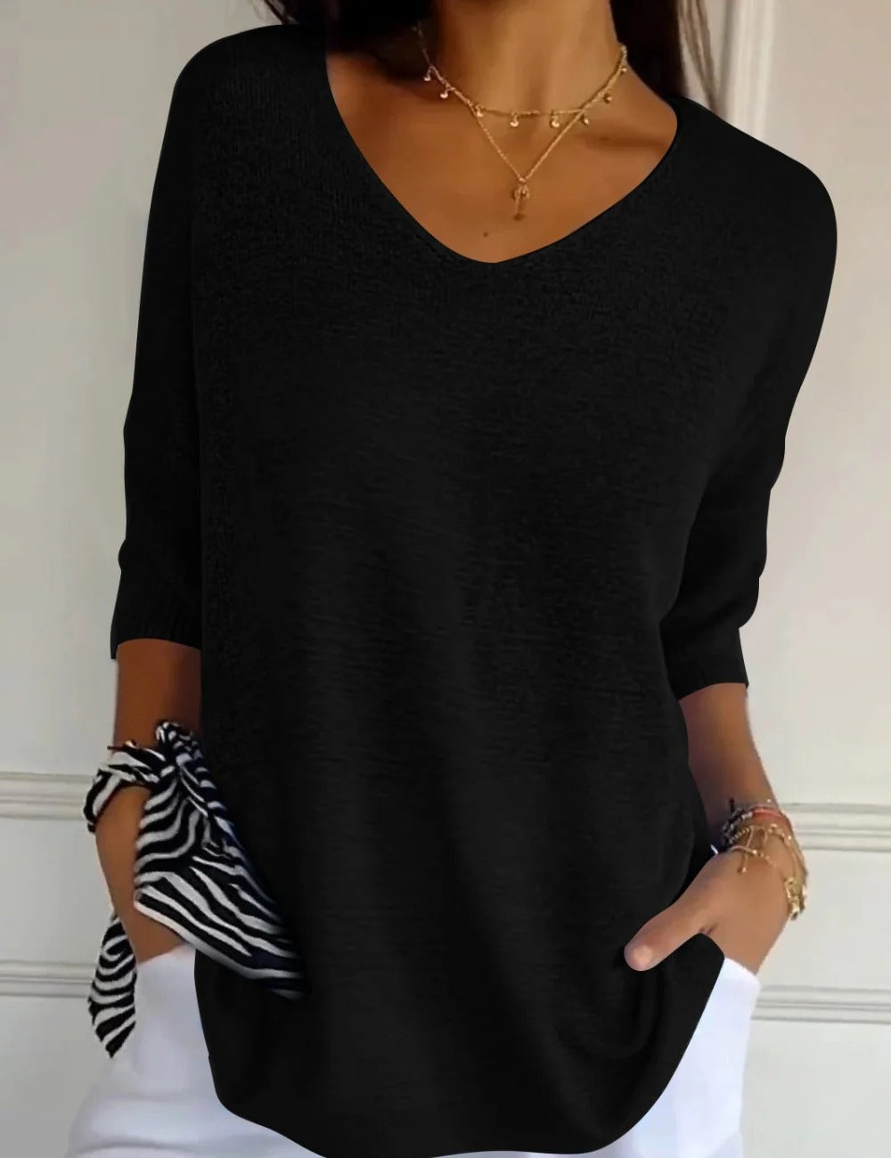 BLUSA LIGERA CON ESCOTE DE V